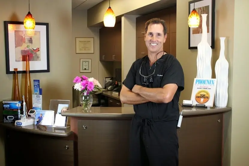  Dr. Jerome Riddle standing in front of reception area at Jerome Riddle DDS 